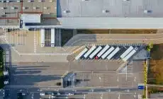 aerial view of vehicles in parking area